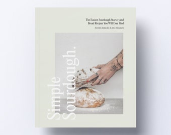 Peut inclure: Une couverture de livre avec un fond blanc et le titre "Simple Sourdough." en texte blanc. La couverture présente une photo d'une main tenant un pain au levain.