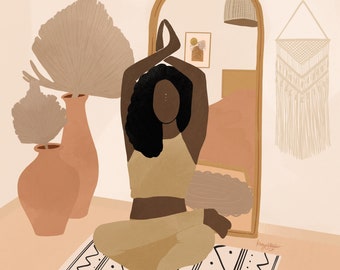 May include: A woman with dark brown hair sits in a yoga pose on a white and black patterned rug. She is wearing a light brown tank top and trousers. The background is a light peach colour with a mirror, a plant, and a macrame wall hanging.