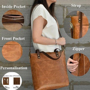 K&ouml;nnte beinhalten: Eine braune Ledertasche mit einer Fronttasche, einer Innentasche und einem Rei&szlig;verschluss. Die Tasche hat einen braunen Trageriemen und einen goldenen Metallverschluss. Die Tasche kann mit einem Buchstaben personalisiert werden.