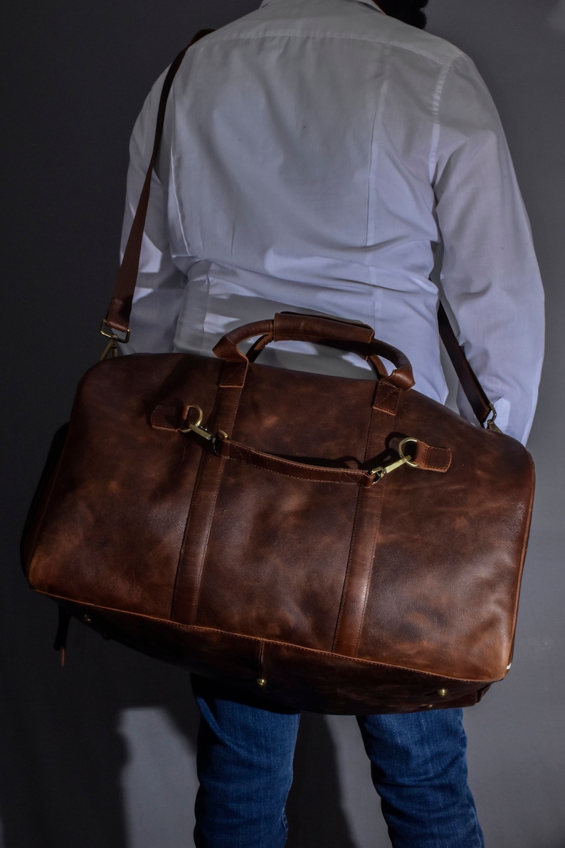 We promise to deliver the bag as per a special date specified by you, even if its within a week! With the bag made of leather guarantee of a lifetime, handcrafted with love, each full grain leather skin is handpicked by us with solid brass fittings.