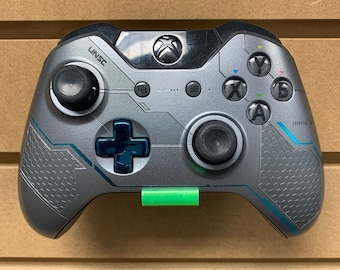 Soporte de pared para mando de Xbox One