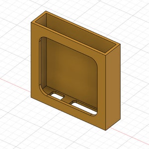 May include: A brown cardboard box with a rectangular opening and two slots cut into the bottom. The box is designed to hold a small object, such as a phone or a tablet.