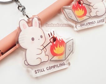 Llavero acrílico de conejo "Sigue compilando", humor de programador