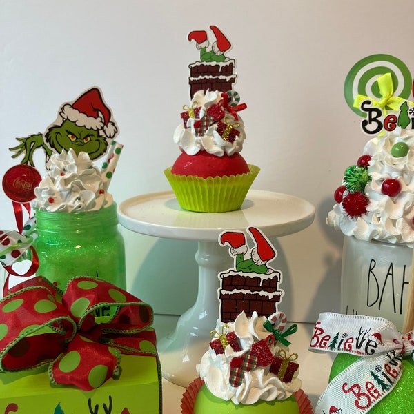 Faux Grinch down chimney Christmas cupcake