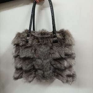 Fue bags,Real Fur Fox bag silver colour Fox fur with sheared  black Rex rabbit fur on sides.