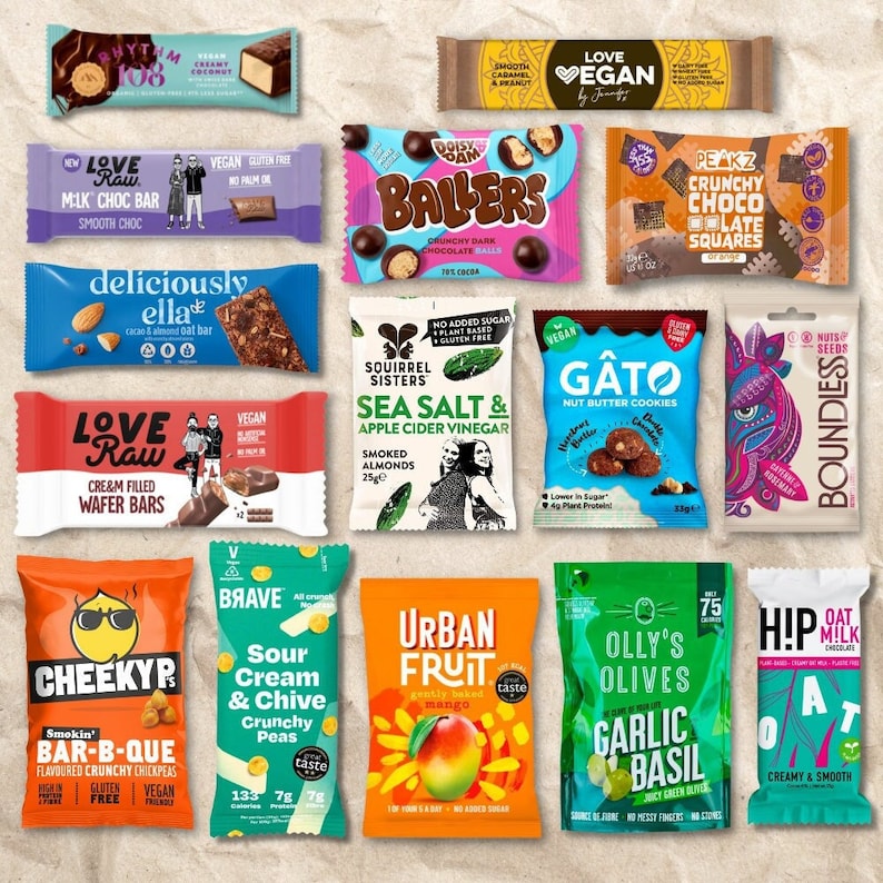 May include: A collage of various snack bar packaging featuring different flavors and brands. The packaging is colorful and features images of the snacks, such as chocolate balls, mango, and olives. The text on the packaging includes the brand names, product names, and ingredients.