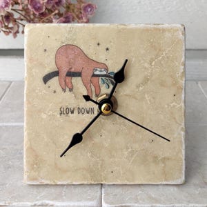 Handmade marble tile clock with sloth motif