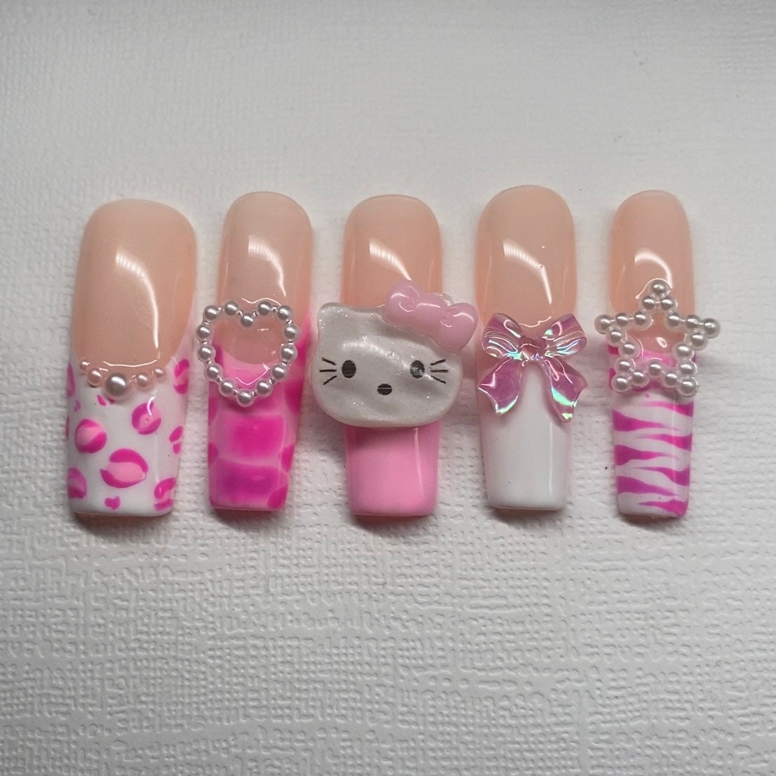 jogo de fazer unhas da Hello Kitty, Desenhos de unhas da Hello Kitty