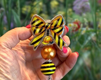 Badgehaspel met bouwcoquetteboog