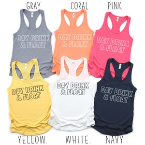 May include: Six tank tops in different colors with the text "Day Drink & Float" printed in white on the front. The colors are gray, coral, pink, yellow, white, and navy.