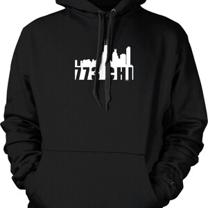May include: Black hooded sweatshirt with a white silhouette of the Chicago skyline and the text "773 CHI" printed on the front.