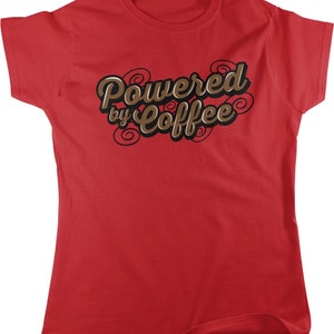 May include: Red t-shirt with the text "Powered by Coffee" in brown lettering with swirls.