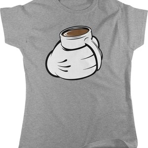 May include: A gray t-shirt with a cartoon illustration of a coffee mug shaped like a fist.