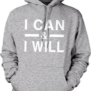 May include: A gray hooded sweatshirt with the text "I CAN & I WILL" printed in white on the front.