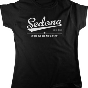 May include: Black t-shirt with white text that reads "Sedona Arizona Red Rock Country".