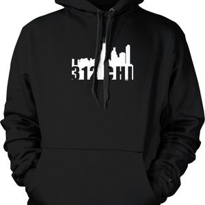 May include: Black hooded sweatshirt with a white silhouette of the Chicago skyline and the text "312 CHI" printed on the front.