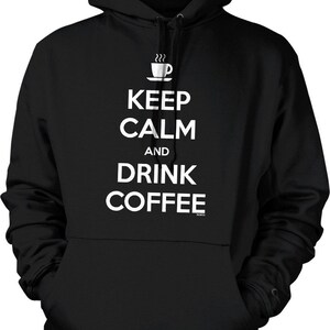 May include: Black hooded sweatshirt with white text that reads "Keep Calm and Drink Coffee" with a coffee cup icon above the text.
