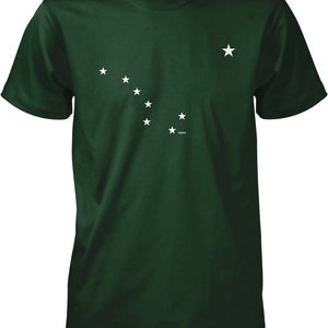 May include: A dark green t-shirt with a white constellation design. The constellation is a stylized version of the Big Dipper.