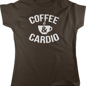 May include: A dark brown t-shirt with the words "COFFEE & CARDIO" in white block letters. A white coffee cup graphic is between the words. The shirt is a crew neck style.