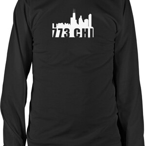 May include: Black long-sleeve t-shirt with a white silhouette of the Chicago skyline and the text "773 CHI".