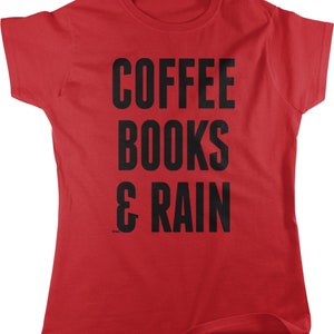 May include: Red t-shirt with black text that reads "COFFEE BOOKS & RAIN".