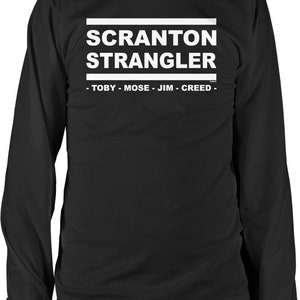 May include: Black long-sleeve t-shirt with white text that reads "Scranton Strangler - Toby - Mose - Jim - Creed -"