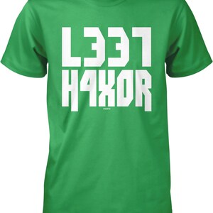 May include: A green t-shirt with the words "LEET HAXOR" printed in white on the front. The words are flipped upside down.