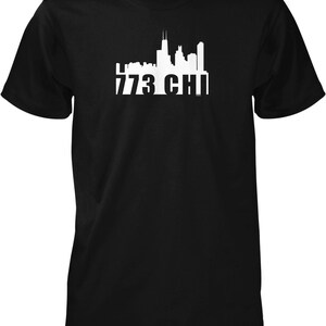 May include: Black t-shirt with a white silhouette of the Chicago skyline and the text "773 CHI" printed on the front.