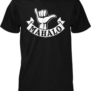 May include: Black t-shirt with a white graphic of a hand making the shaka sign and a banner that says "MAHALO".