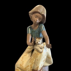 Lladro # 2169,  Repose Gres, Girl With Cat, Retired  1987