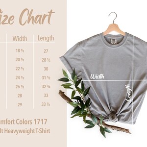 K&ouml;nnte beinhalten: Gr&ouml;&szlig;entabelle f&uuml;r ein graues T-Shirt mit Ma&szlig;en in Zoll. Die Tabelle zeigt die Breite und L&auml;nge des Shirts in den Gr&ouml;&szlig;en S bis 4XL. Der Text "Comfort Colors 1717 Adult Heavyweight T-Shirt" ist ebenfalls sichtbar.