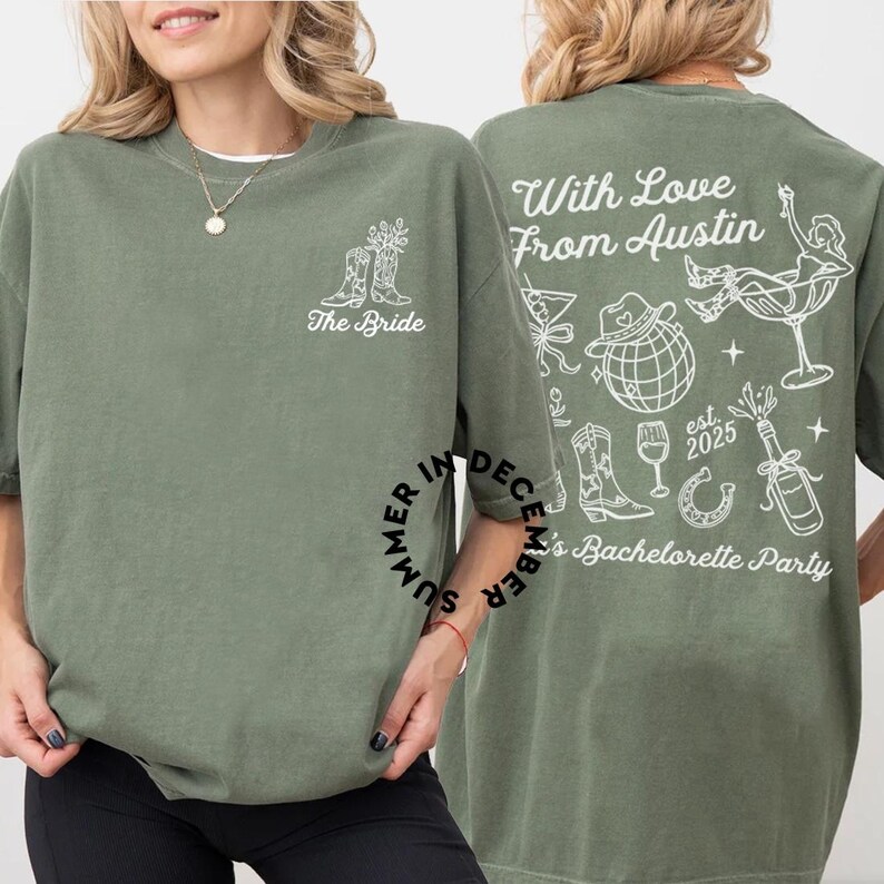 May include: Two green t-shirts with white text and graphics. The front shirt says "The Bride" with a pair of cowboy boots and flowers. The back shirt says "With Love From Austin" with a variety of graphics including cowboy boots, a glass of wine, a horseshoe, and a bottle of champagne. The text also says "Summer in December's Bachelorette Party est. 2025."