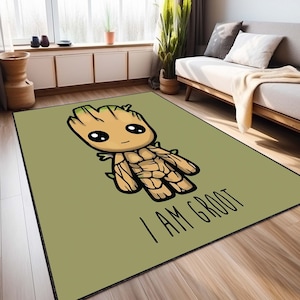 Könnte beinhalten: Ein grüner Teppich mit einem Cartoon-Bild von Groot aus Guardians of the Galaxy. Der Text "I AM GROOT" ist auf dem Teppich gedruckt.