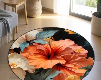 May include: A round floral rug with a dark background featuring large orange and white hibiscus flowers with green leaves.