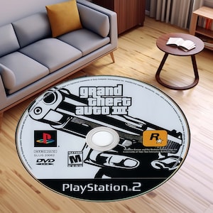 May include: A white PlayStation 2 game disc for Grand Theft Auto III. The disc features a black and white image of a gun with the game title and rating printed on it.