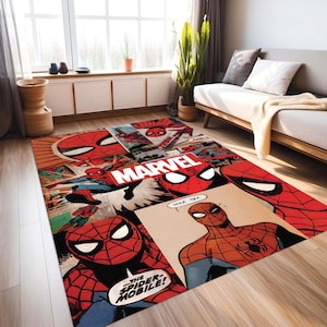 May include: A rectangular area rug featuring a vibrant Marvel comic book collage of Spider-Man in various action poses. The design includes red and blue character illustrations, black webbing patterns, and text bubbles reading Marvel, Nice Try, and The Spider-Mobile.