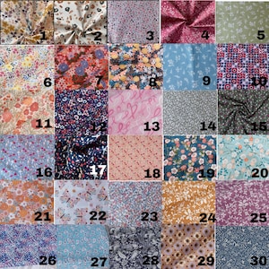 May include: A grid of thirty fabric swatches featuring diverse patterns including floral prints, geometric shapes, abstract designs, and animal motifs in various colors such as blue, pink, green, yellow, brown, and black, each labeled with a number.