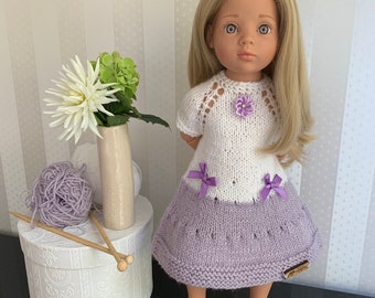 Hand-knitted doll dress