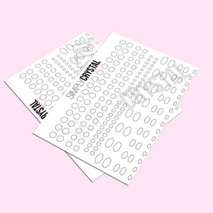 May include: Two white sheets of paper with a grid of circles printed on them. The sheets are stacked on top of each other and the top sheet is slightly offset. The text "SIMPLY CRYSTAL" is printed on the top sheet.