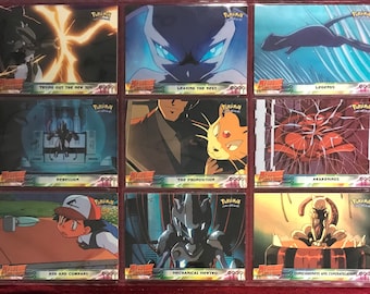 pokemon the movie cards 1999 Pokemon The 1st Movie Ash Sticker Puzzle Chase Card Set 9 Blue Lo —  TvMovieCards.com main image 0