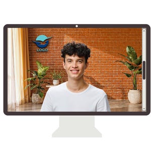 May include: A computer monitor showing a person in a white t-shirt smiling. The background includes a brick wall, plants, and a logo. The monitor is on a white stand.