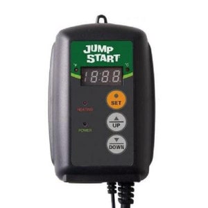 May include: A black and green Jump Start thermostat with a digital display showing 18.88 degrees. The thermostat has buttons for power, heating, set, up, and down.