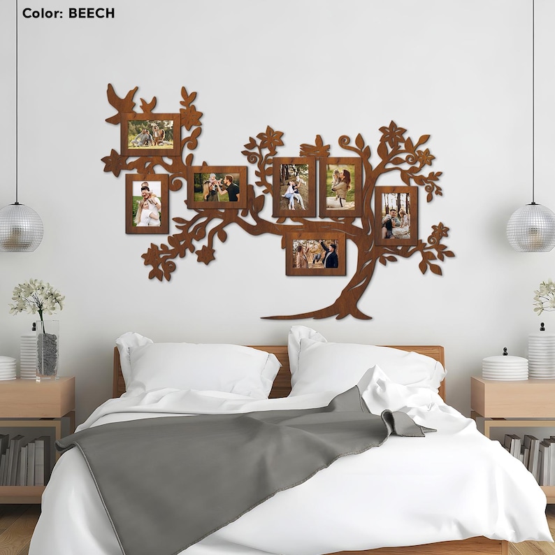 May include: A wooden wall decor in the shape of a tree with eight photo frames. The frames are arranged in a branch-like pattern. The tree is painted in a brown color. The word "BEACH" is written in white text on a white background.