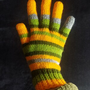 May include: Yellow and green striped knitted gloves with gray accents.