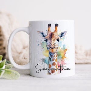 May include: White ceramic mug featuring a watercolour illustration of a giraffe's head with colourful splashes of paint. The mug is personalised with the name "Samantha" written in black cursive at the bottom.