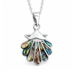 May include: A silver-toned pendant necklace featuring a seashell design. The pendant has a shell-shaped base with iridescent abalone shell inlay in shades of blue, green, and brown. The necklace chain is a delicate silver color.