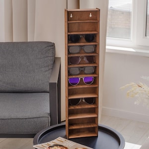 Soporte de madera para gafas de sol para pared, estante de exhibición de gafas de madera contrachapada de alta calidad, almacenamiento de gafas de sol montado en la pared, organizador personalizado para gafas.