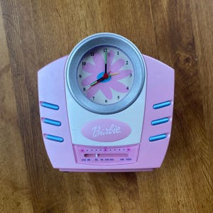 May include: A set of three ceramic mugs with a speckled, matte finish in cream, light grey, and dark grey. Each mug has a simple, minimalist design, suitable for coffee or tea.