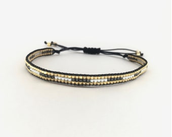 Geweven armband van zwarte, gouden en zilveren Miyuki-kralen