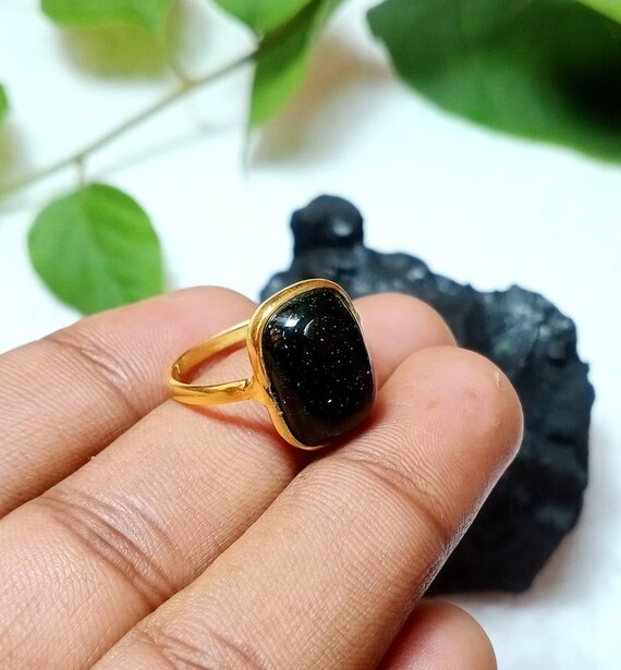 Green goldstone best sale ring